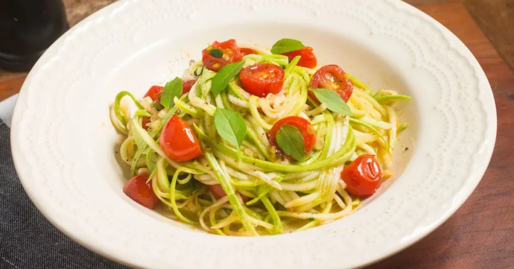 Zucchini Noodles with Pesto and Cherry Tomatoes